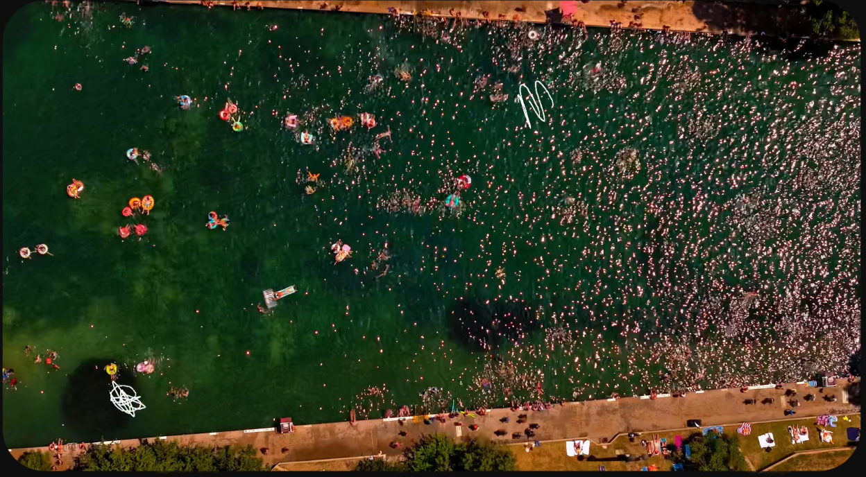 Barton Springs Pool natural spring-fed swimming pool in Austin Texas Zilker Park, featured in numerous films as an iconic Austin landmark