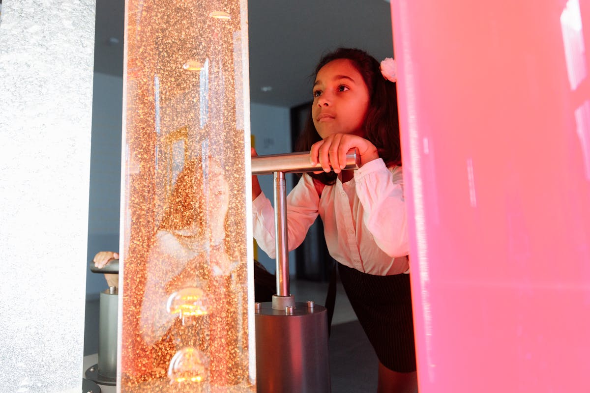 Families exploring interactive exhibits at the Thinkery children's museum
